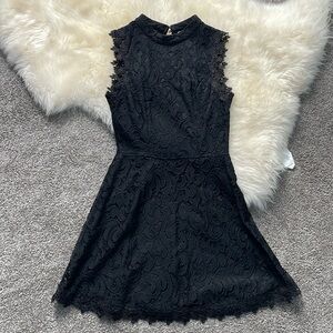 Black lace open back mini dress